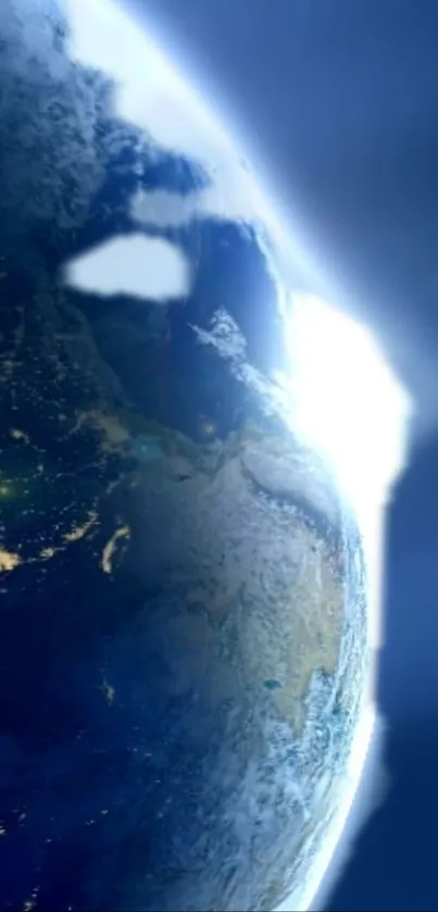 Stunning blue view of Earth from space displaying night and day.