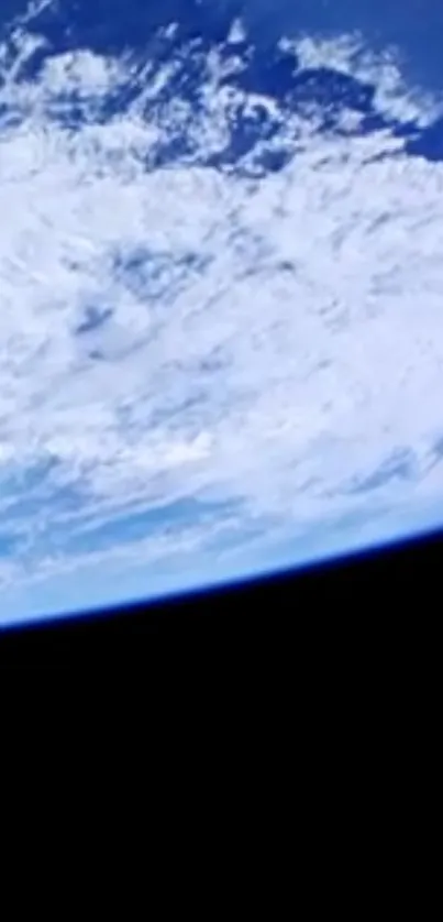 A stunning view of Earth from space with a vibrant blue and black contrast.