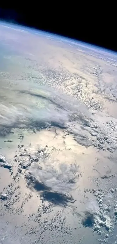 A stunning view of Earth from space featuring oceans and clouds.