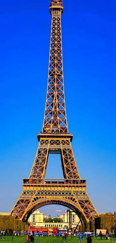 Eiffel Tower against a bright blue sky, a stunning landmark wallpaper.