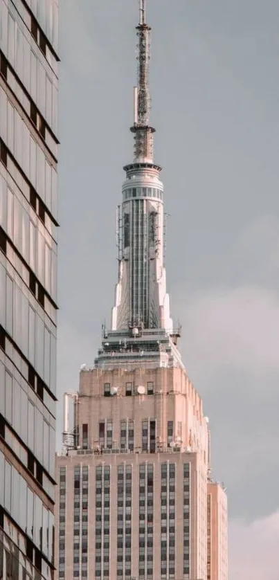 Empire State Building with a modern city backdrop.