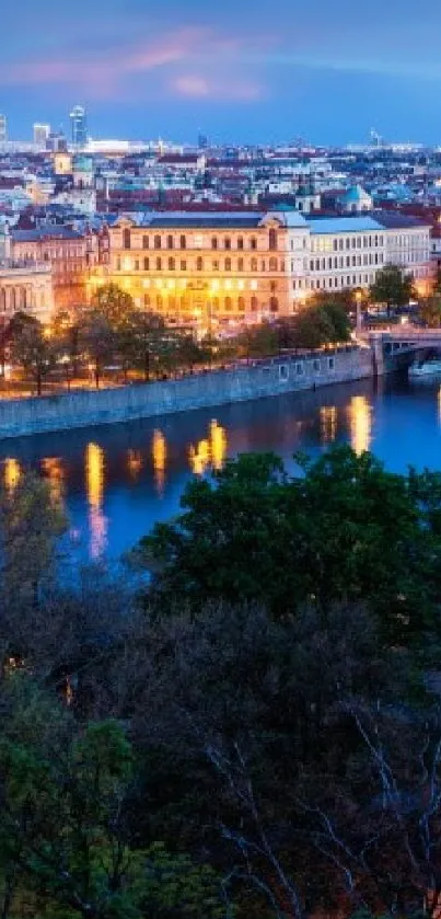 Evening cityscape with lights reflecting on a river.