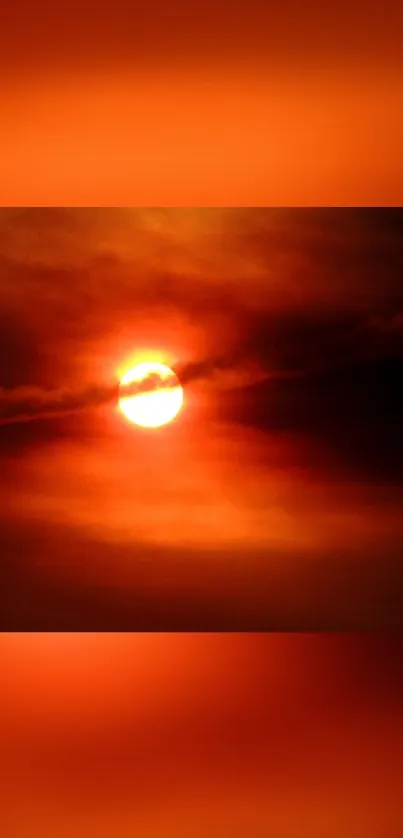 Fiery red sunset with glowing clouds.