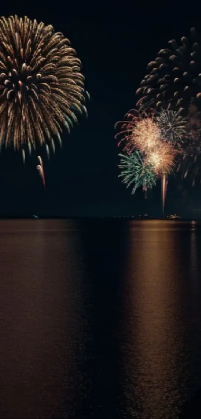 Vibrant fireworks display over water at night with reflections.