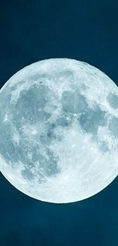 A bright full moon against a deep blue night sky, perfect for calming mobile backgrounds.