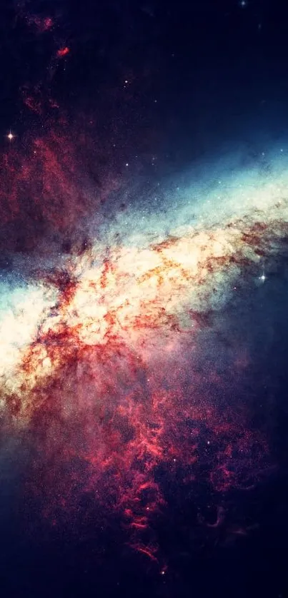 Explosive galaxy with vibrant blue and red colors in space themed wallpaper.