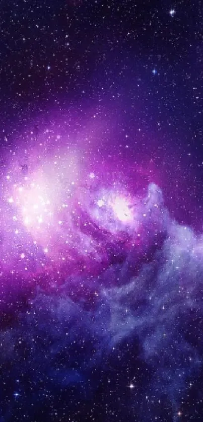 Vibrant galaxy nebula with purple hues and starry night sky.