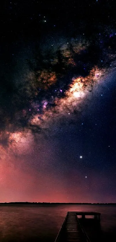 Beautiful galaxy night sky wallpaper with vivid cosmic colors and tranquil horizon.