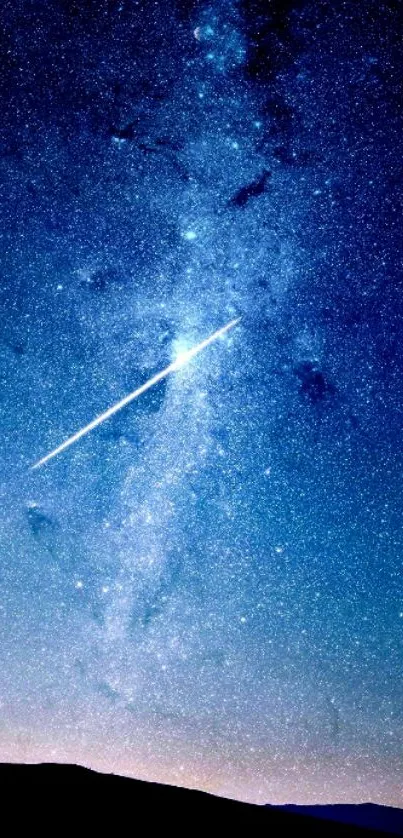 Stunning night sky wallpaper with galaxy and shooting star in deep blue tones.