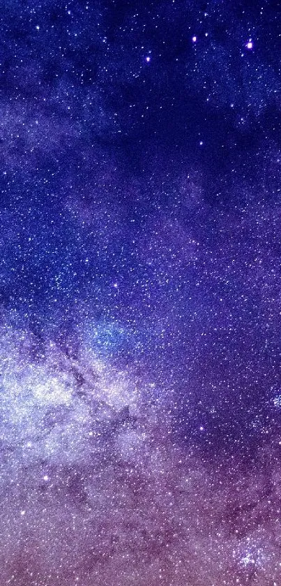 Vibrant galaxy night sky wallpaper with purple hues and stars.