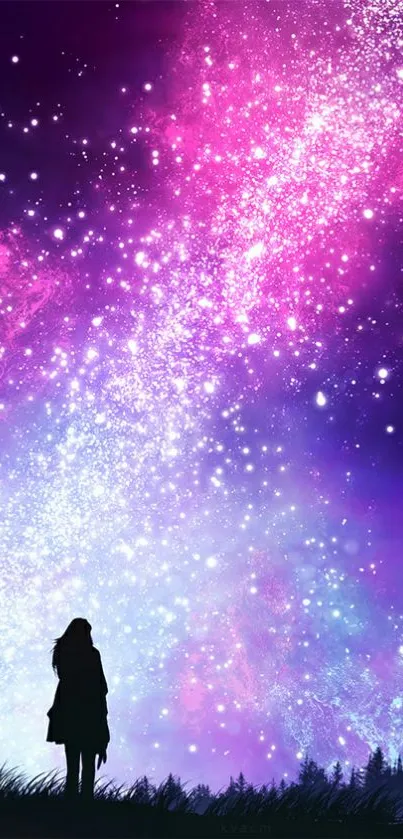 Silhouette against a vibrant galaxy backdrop with purple and pink hues.