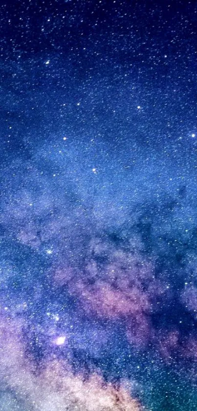 Colorful galaxy wallpaper with stars and cosmic clouds.