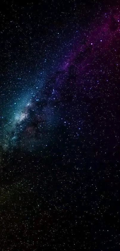 Vibrant galaxy wallpaper with stars and colorful nebulae for mobile screens.