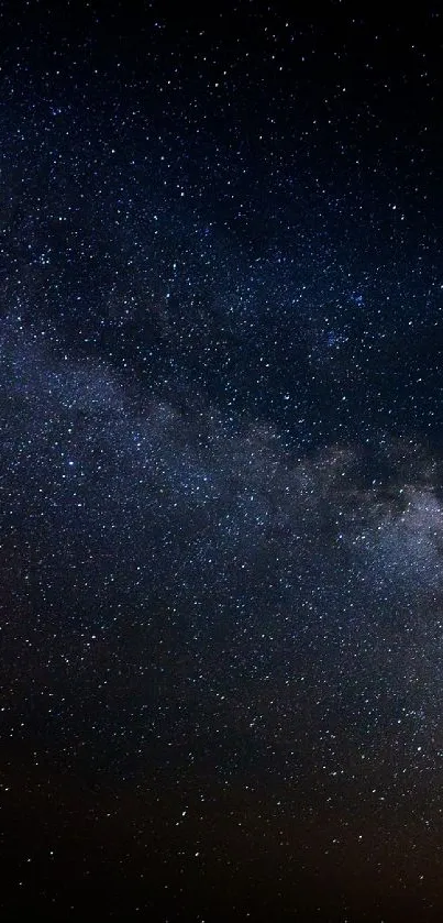 Mobile wallpaper featuring a starry galaxy with the Milky Way under a vast night sky.