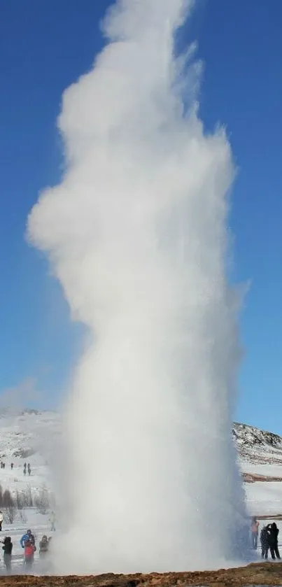 Geyser eruption against clear blue sky in nature wallpaper.