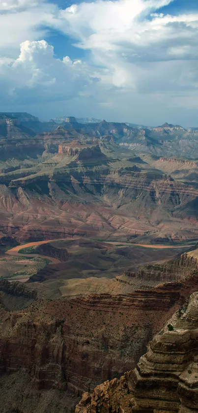 Breathtaking view of the Grand Canyon under a cloudy sky.