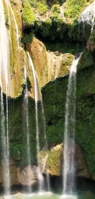 Majestic green waterfall cascading down lush cliffs.