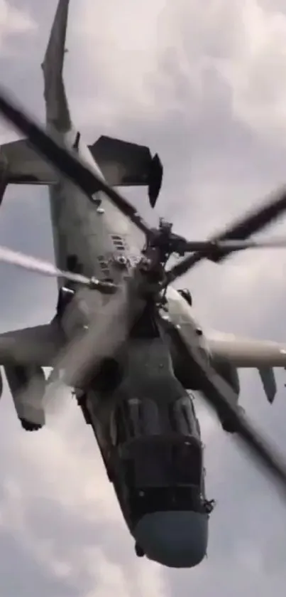 A powerful helicopter hovering against a cloudy sky.