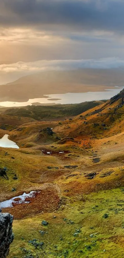 Golden brown highland landscape with lakes at sunrise.