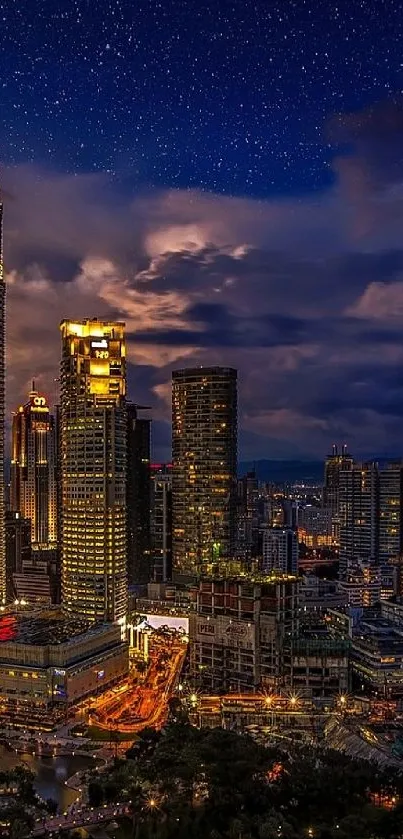 Night view of Kuala Lumpur skyline with Petronas Towers under a starry sky.