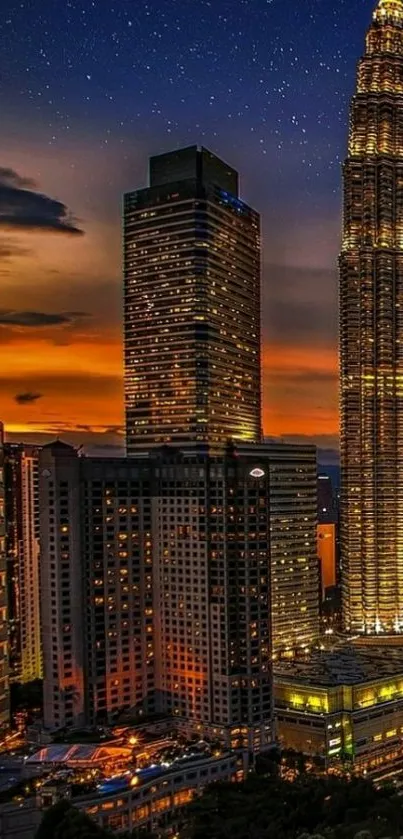 Kuala Lumpur skyline with Petronas Towers at night, bathed in city lights.