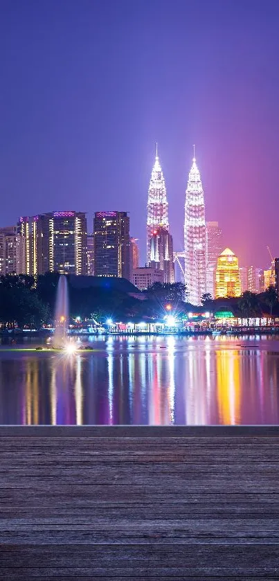 Kuala Lumpur skyline at twilight with city lights and reflections.