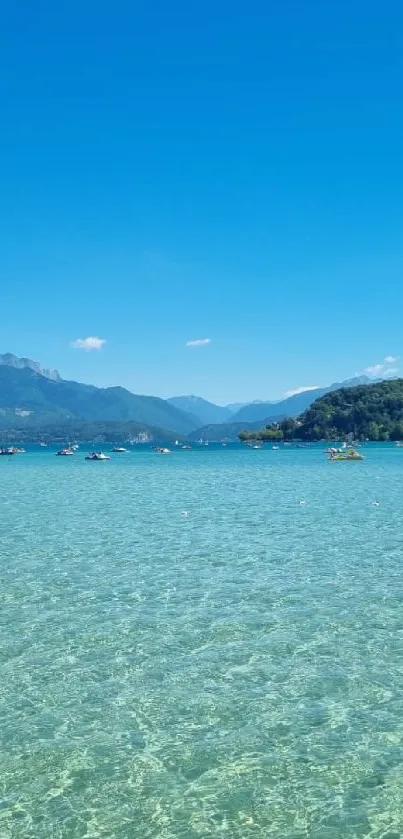 Serene lake and mountain view with clear blue sky.