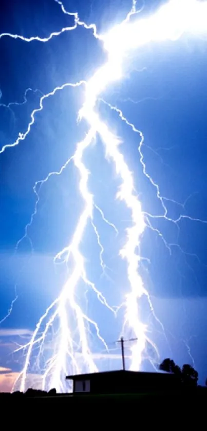 Electrifying lightning storm with blue nightsky in a dramatic evening landscape.