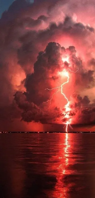 Dramatic lightning brightens fiery storm clouds over a reflective water surface.