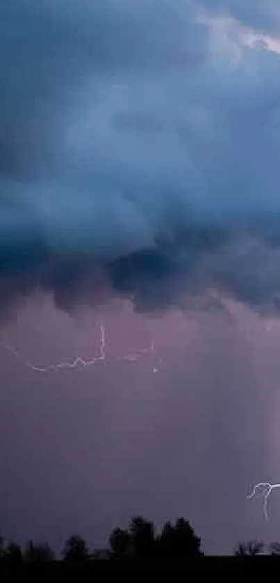 Dramatic lightning storm under a dark navy blue sky.