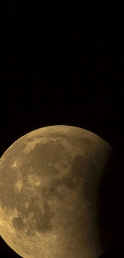 Lunar eclipse with moon in shadow against dark sky wallpaper.