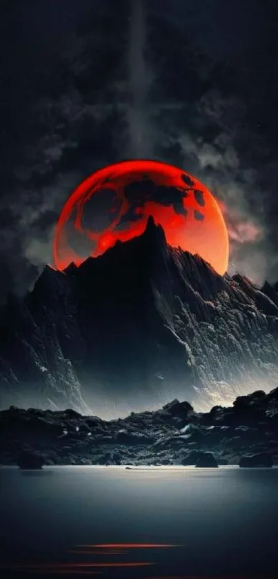 Red moon over mountain in dark sky.