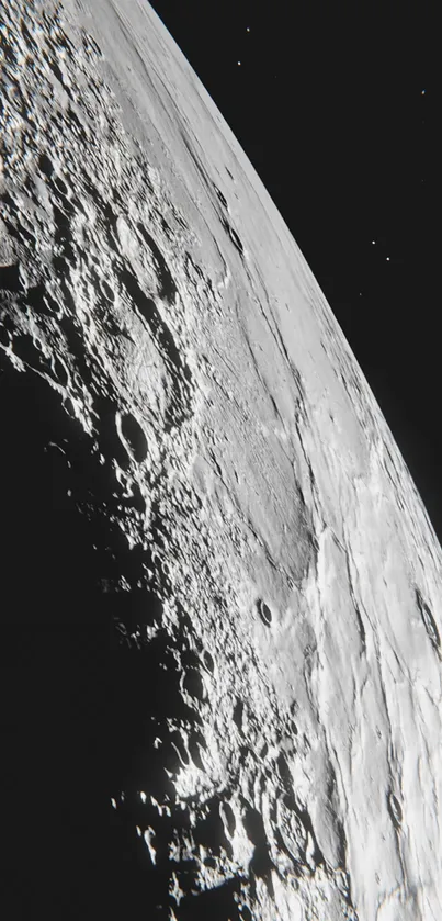 High-resolution photo of the moon's cratered surface against a black space background.