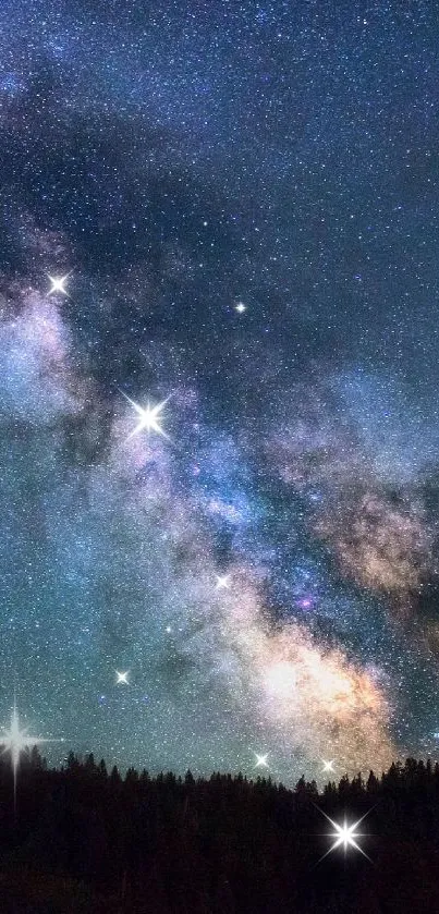 A stunning view of the Milky Way galaxy over a dark rural landscape at night.