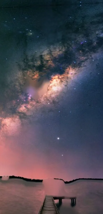 Milky Way galaxy over a serene dune pathway.