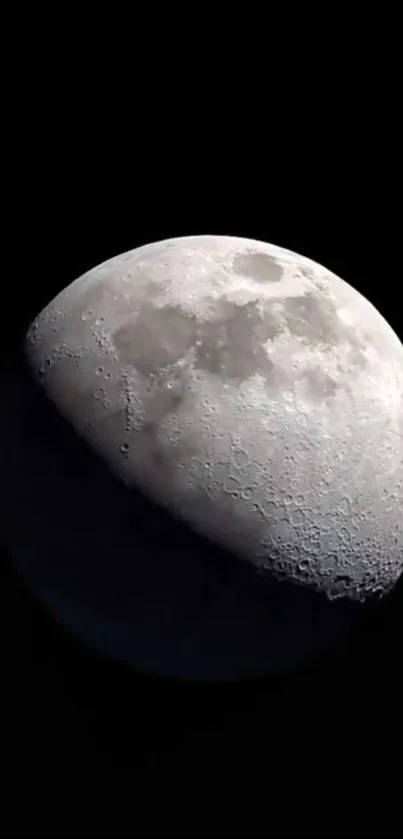 Realistic image of the moon against a black sky, showcasing detailed lunar surface.