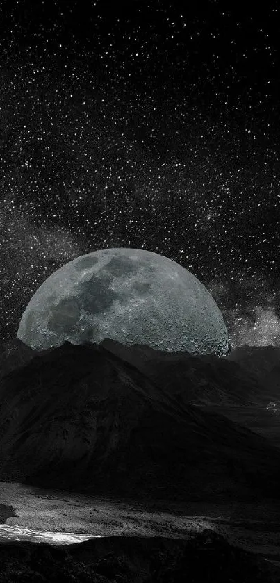 Majestic moon rising over dark mountains under a starry sky.