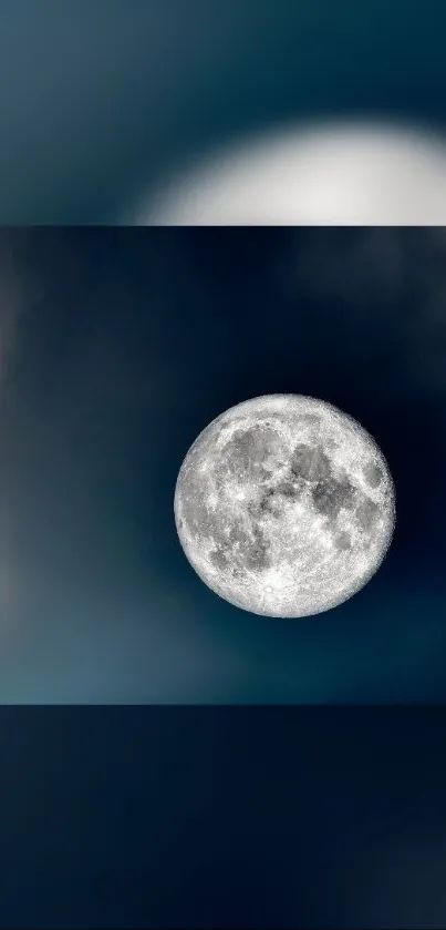 Full moon in a dark blue night sky wallpaper.