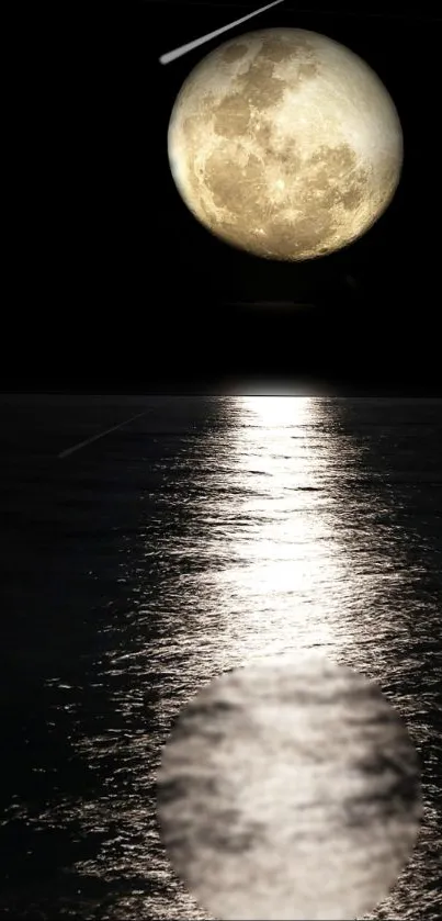 Full moon reflecting on a tranquil ocean under a clear night sky.