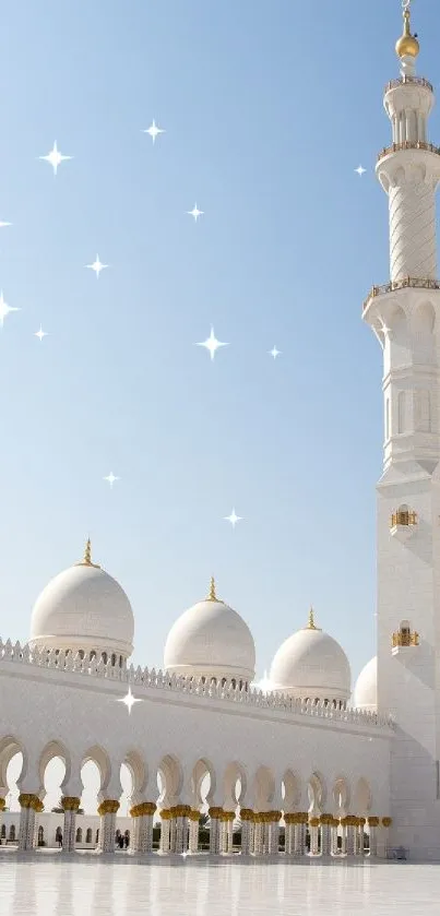 Beautiful mosque architecture under a clear blue sky.