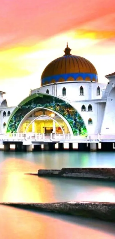 Stunning mosque at sunset with vibrant colors and serene reflection.