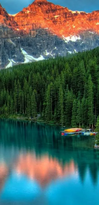 Tranquil mountain lake with golden peaks.