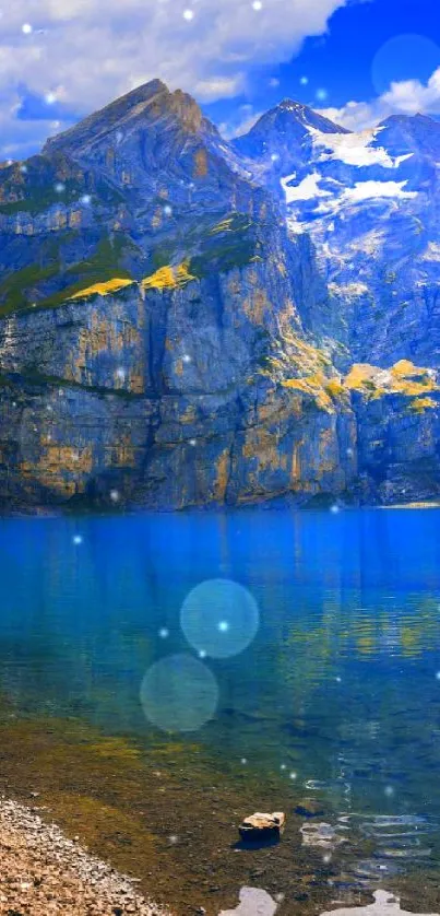 Beautiful mountain lake with clear blue water and snow-capped peaks.