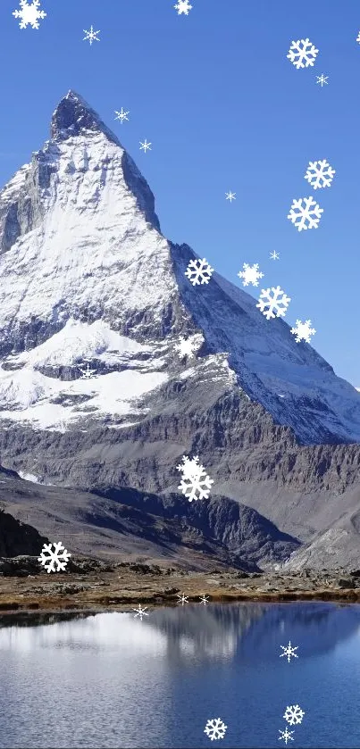 Majestic mountain reflecting in a serene lake under clear blue skies.