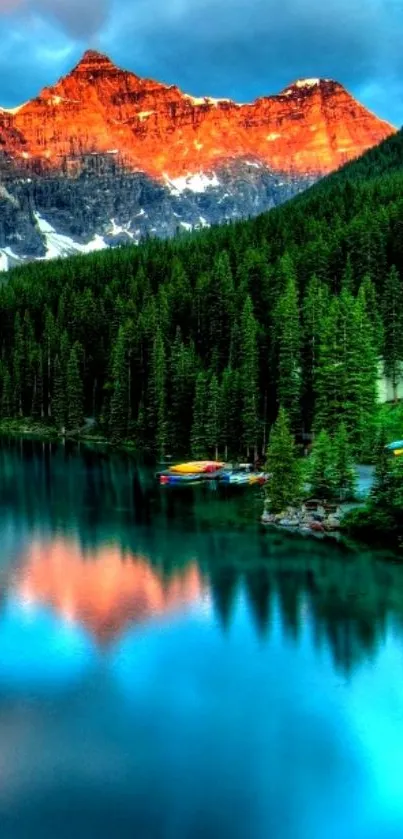 Tranquil mountain lake with sunrise and forest reflections.