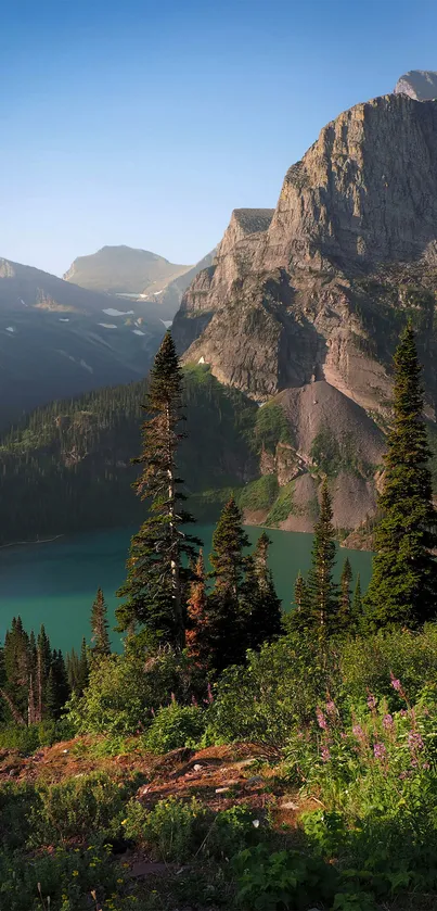 Beautiful mountain and lakeside view with trees and greenery.