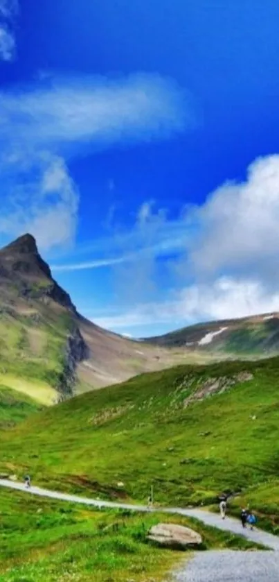 Blue sky and green mountain landscape wallpaper.