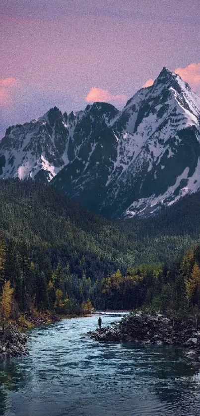 Beautiful mountain river scene at sunset with snowy peaks and lush forests.