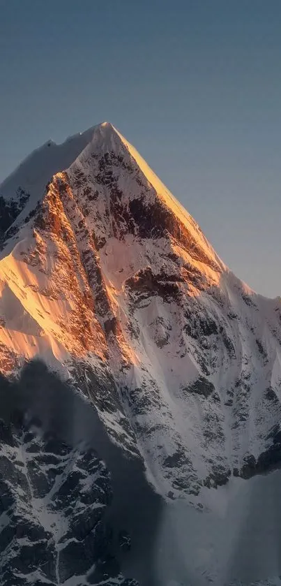 Stunning sunset over a snow-capped mountain peak.