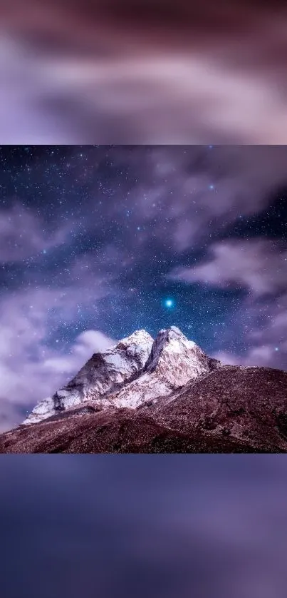 Majestic mountain under a starry sky with celestial beauty captured.